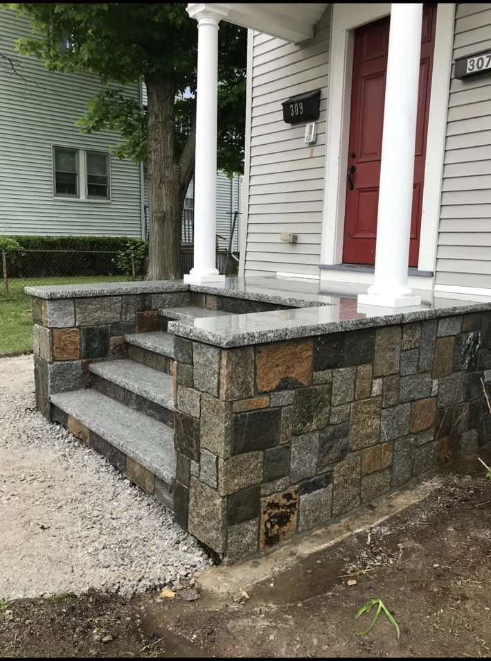 Finished granite and stone front entry