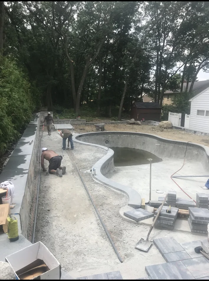 Pool area hardscape installation